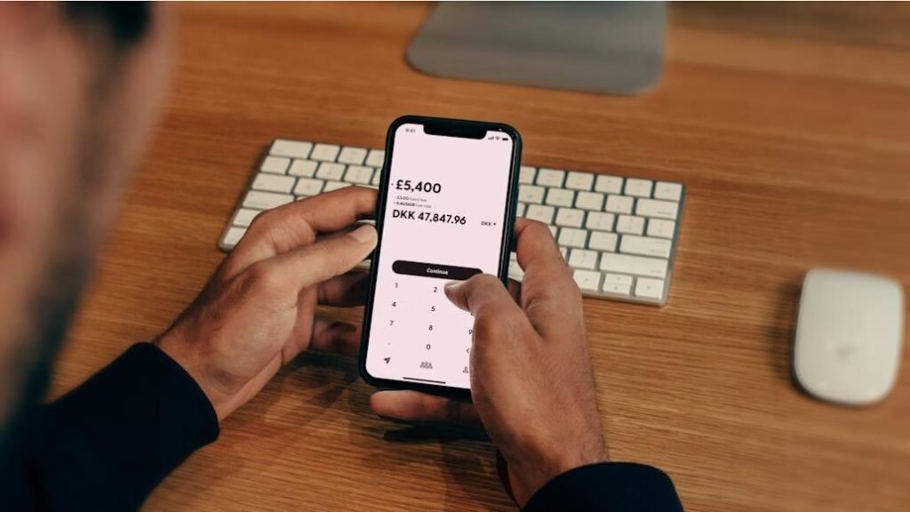 Online money transfer on smartphone avoiding mistakes and fees