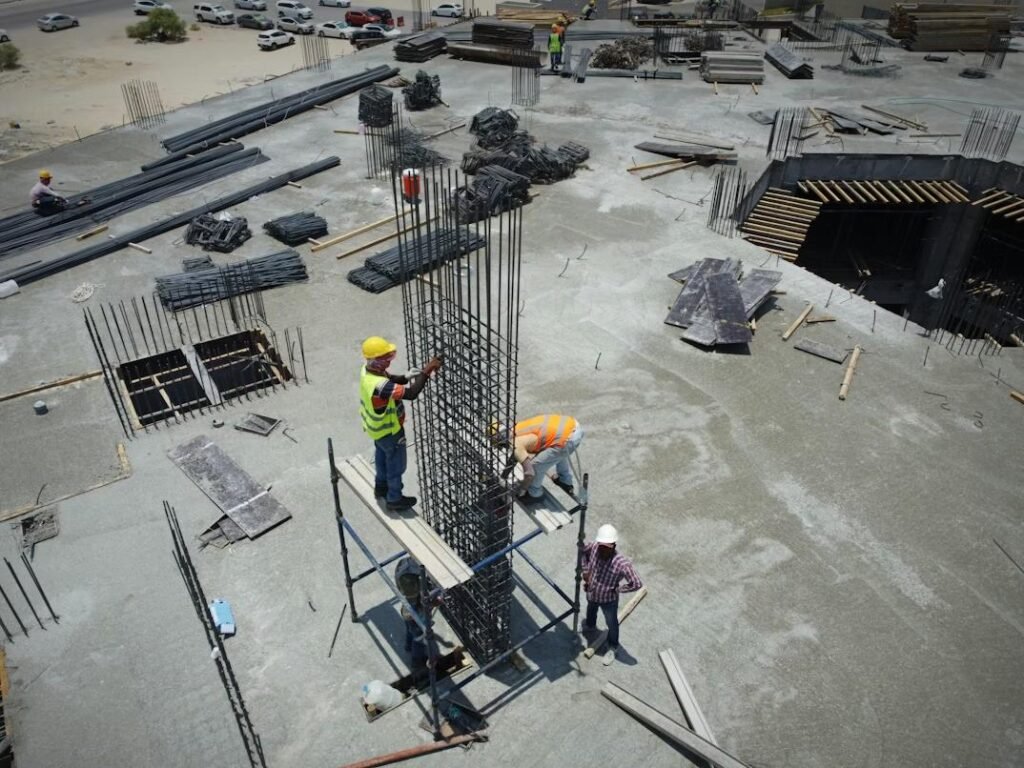 Workers balancing safety and productivity in engineering construction site