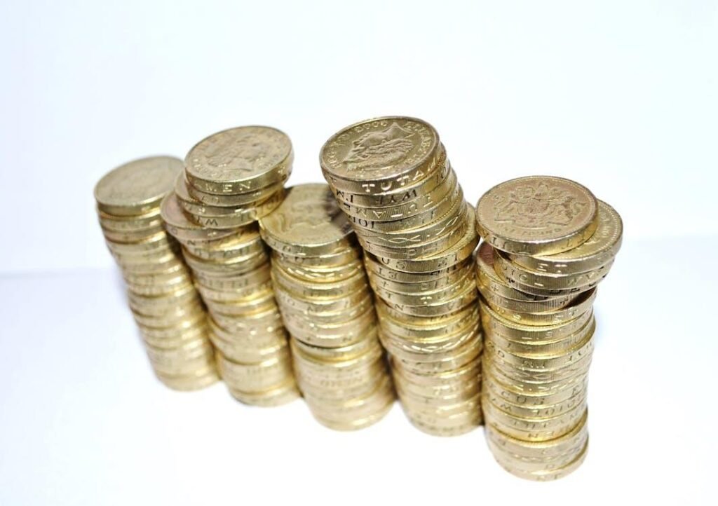Why Some Borrowers Turn to Asset-Secured Loans During Emergencies Stacks of coins symbolizing asset-secured emergency loans.