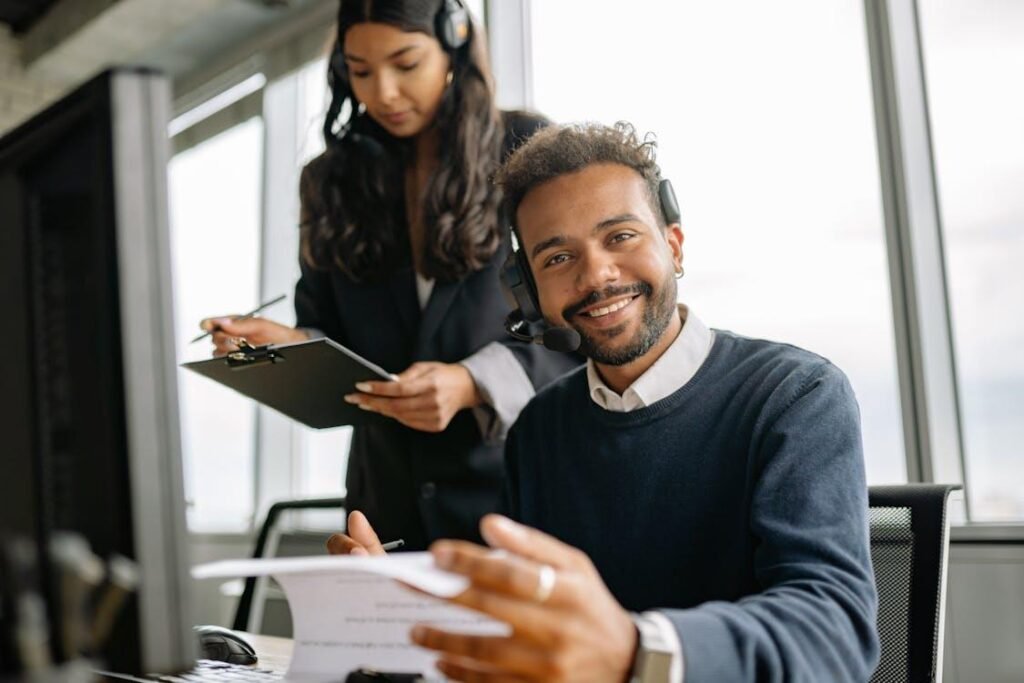 Building a Cost-Effective Customer Support System Through Strategic Outsourcing Partnerships Customer support team collaborating through outsourced service operations