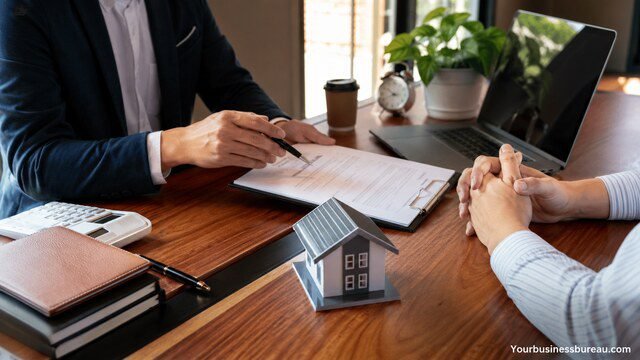 Business consultant reviewing professional liability insurance documents with a client.