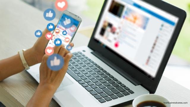 Sharing content on social media using smartphone and laptop